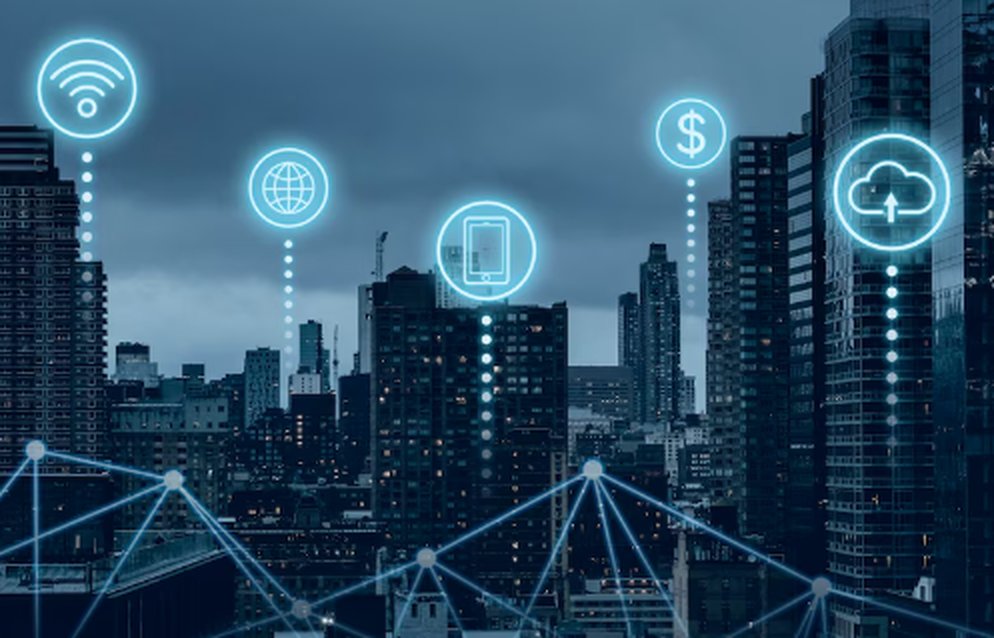 City skyline with digital infrastructure icons representing wireless networks, global connectivity, cloud computing, and financial technology, illustrating the backbone of modern urban technology systems.