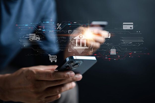 A person uses a smartphone and credit card while digital banking icons appear around them, representing secure mobile transactions and innovation in the best online banks for beginners.